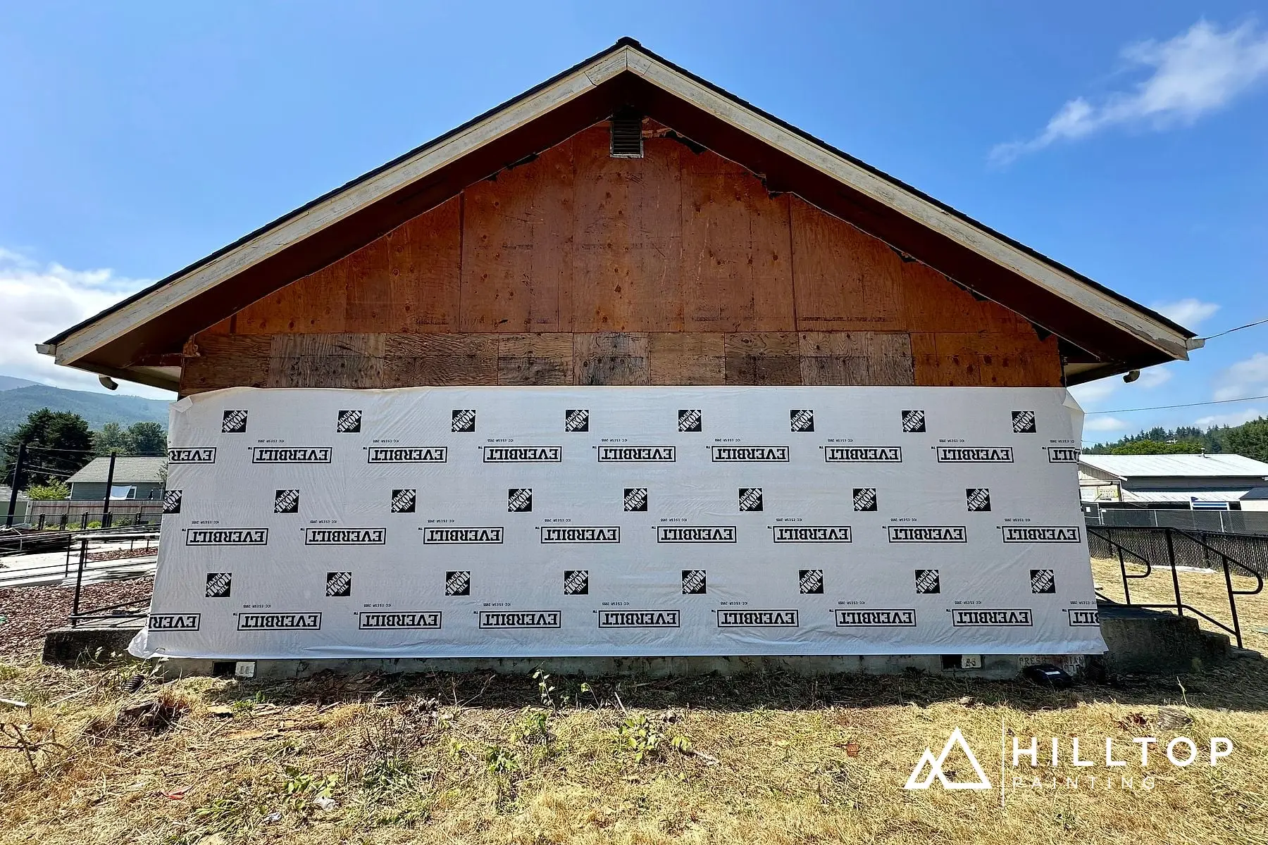 Re-Sided, Repaired & Repainted — a Deming Commercial Building in Sage Green — photo 6