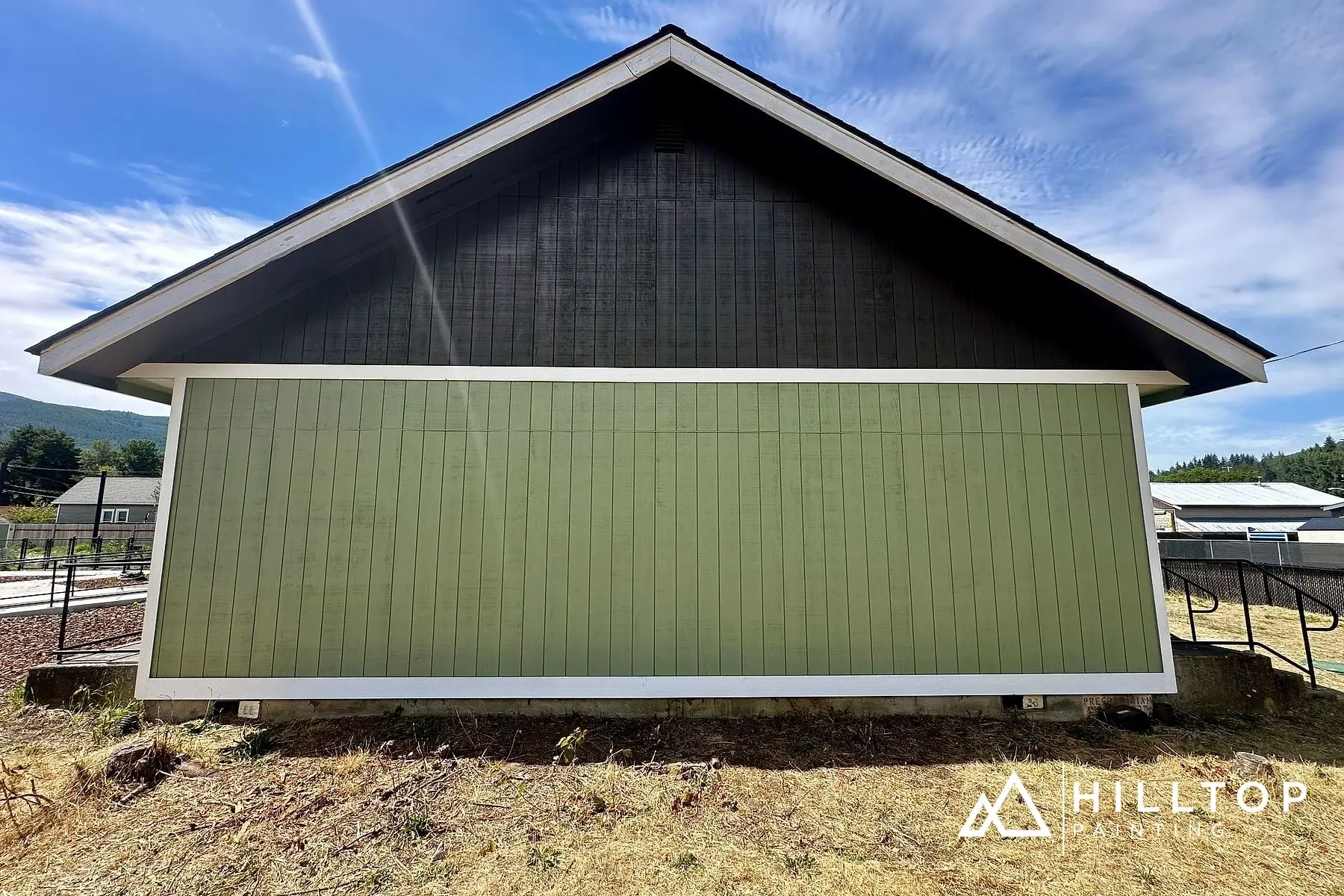 Re-Sided, Repaired & Repainted — a Deming Commercial Building in Sage Green — photo 4