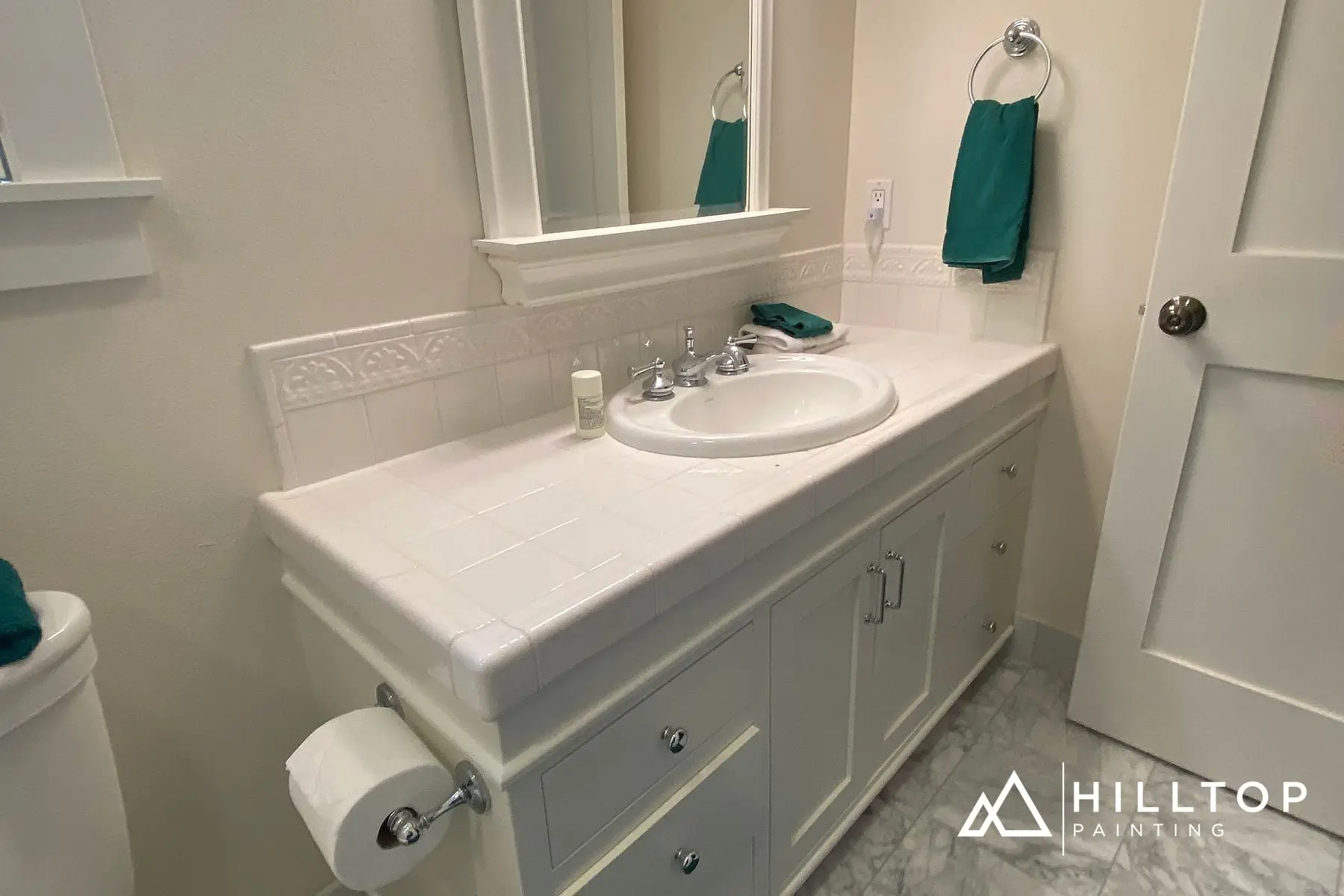 After: A White Farmhouse Kitchen & Its Matching Bath — Early Bellingham Cabinet Work That Still Holds Up