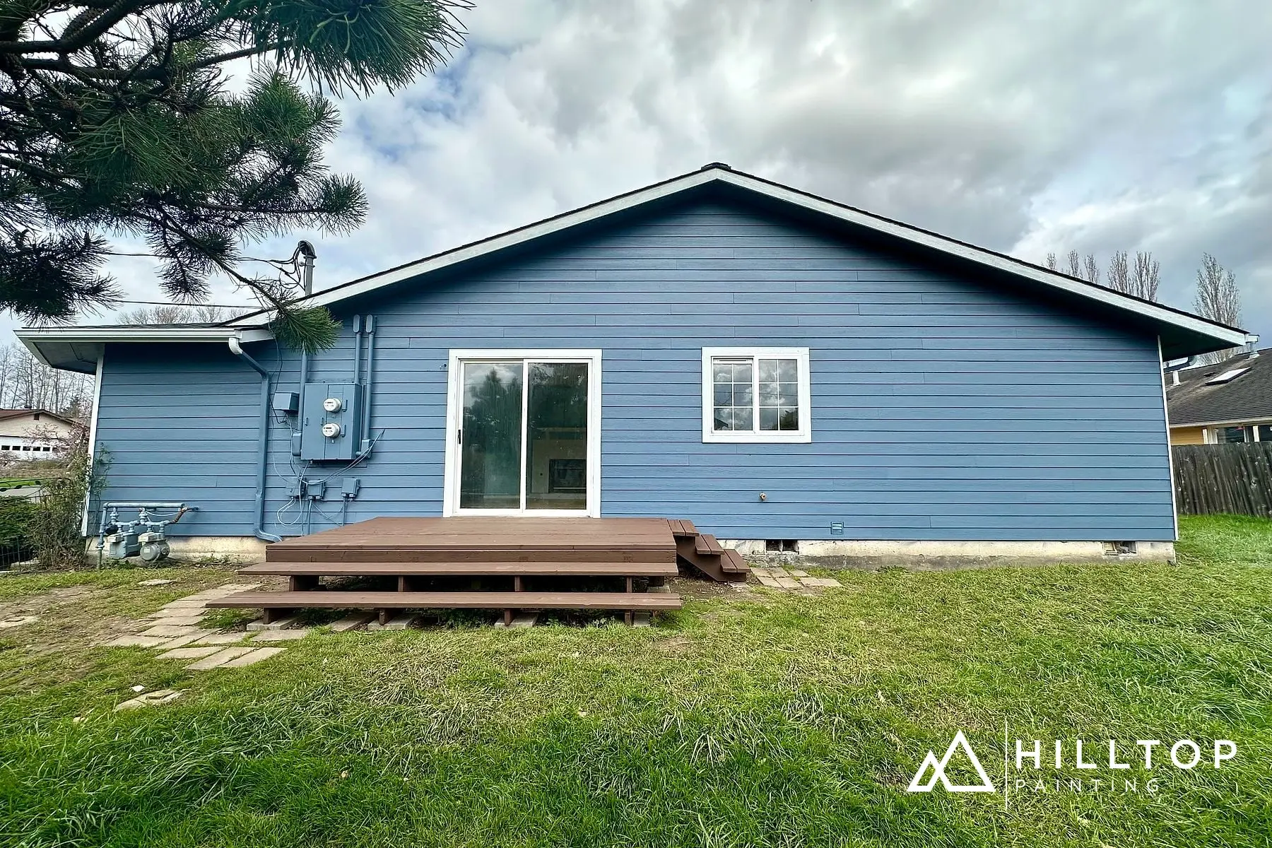 After: A Bellingham Rental Duplex — Re-Sided, Decked & Turned Navy in Latitude