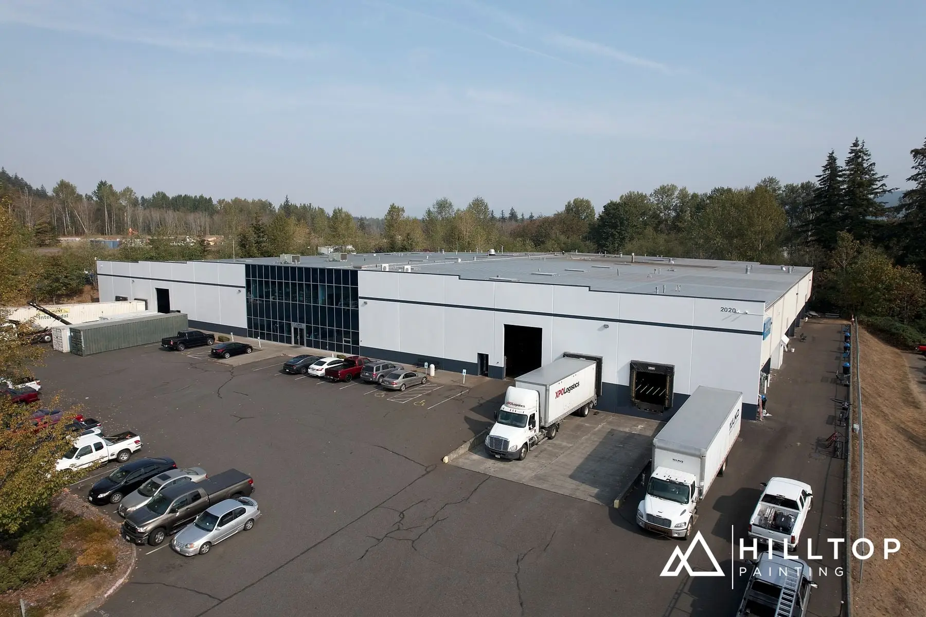 The LKQ Warehouse off Bakerview — a Boom-Lift Repaint in Two Colors — photo 1